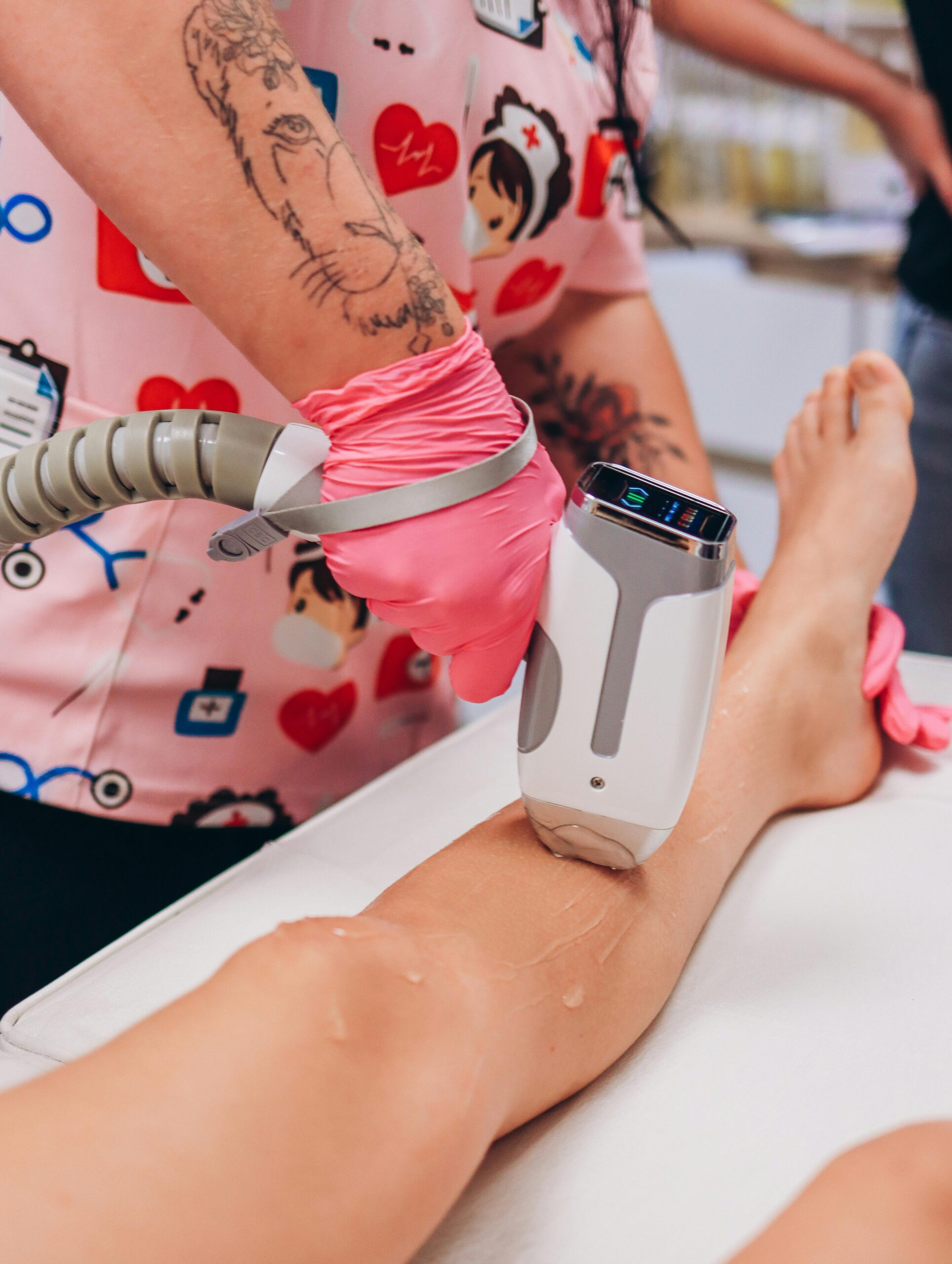 Professional laser hair removal treatment taking place in a Polish salon.