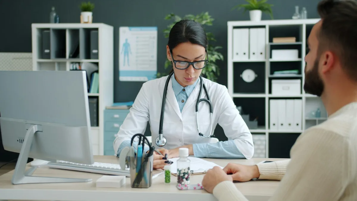 Doctor meeting with a patient at a clinic desk, showing how to start a suboxone clinic with the right prescriber team