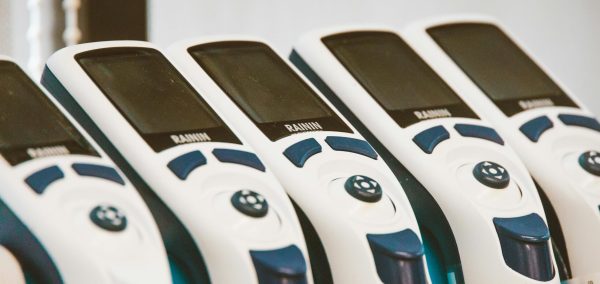 Close-up of medical devices lined in a row, showcasing technology and design.